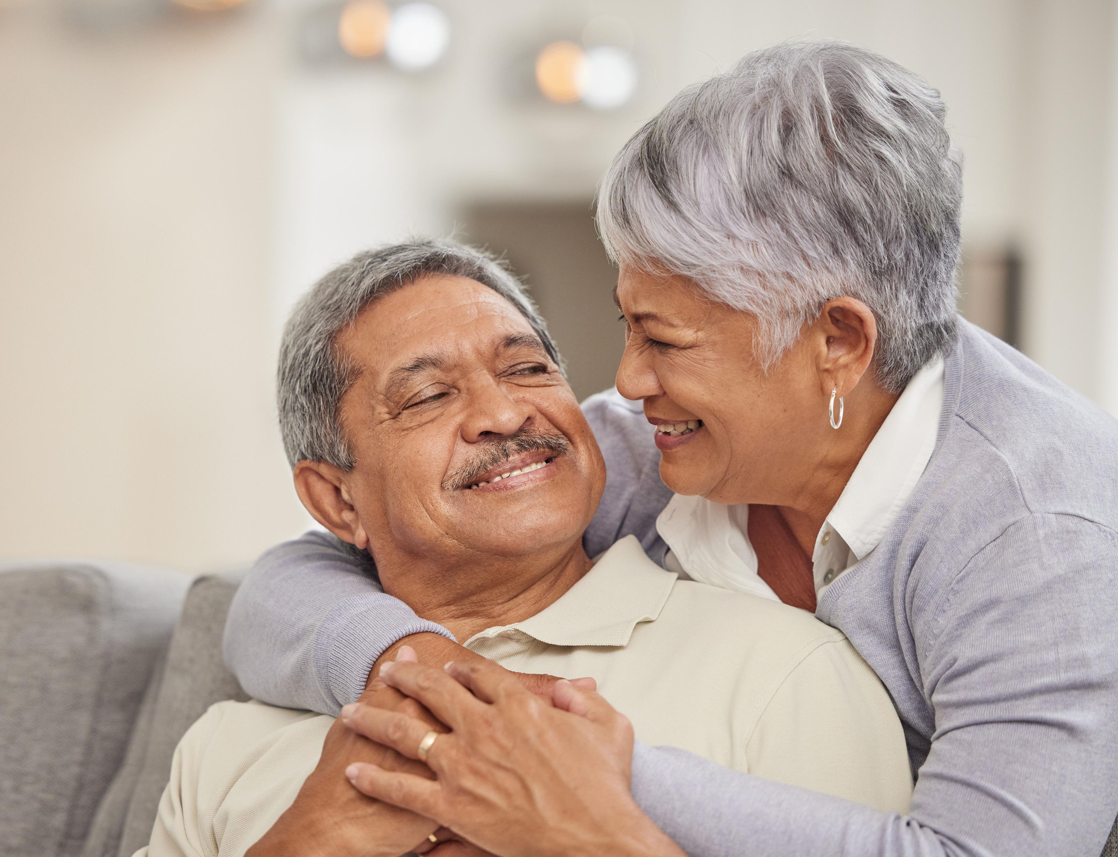 Hispanic couple smile at each other as they embrace, Teva Clinical Trials, diversity, research, health equity,